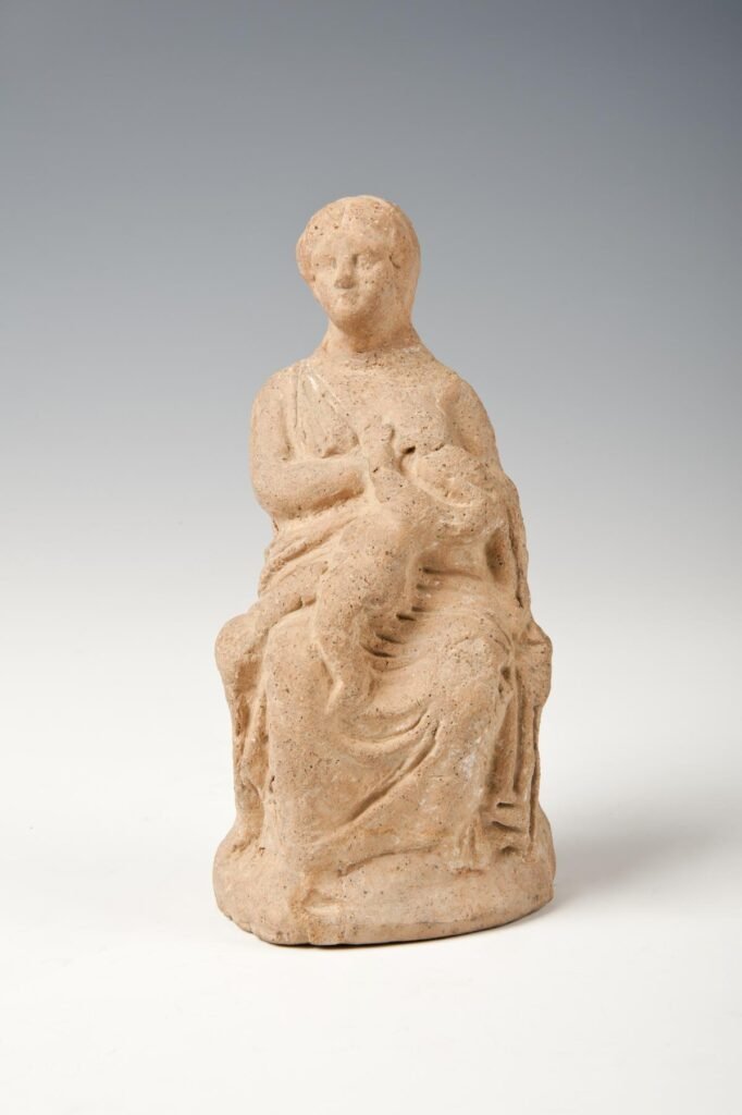 Mujer amamantando. Terracota. Grecia continental. 400-300 a.C.